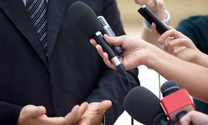 public relations for small business, men answering jouralists