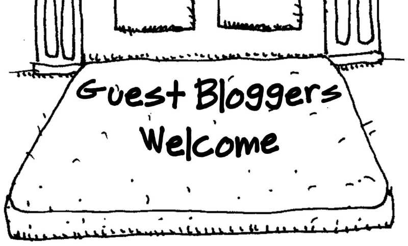 guest bloggers welcome sign featuring a bed on the floor