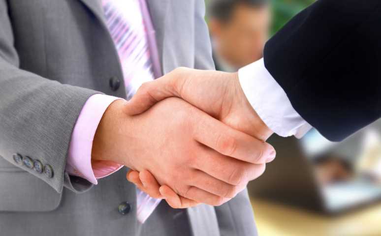 cooperation handshake - alternative text
