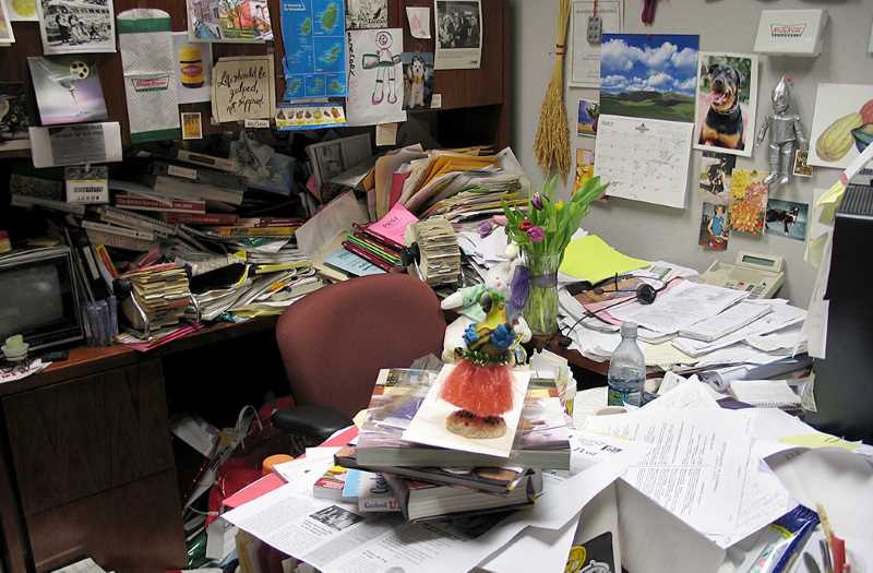 Office messy desk, health risks of home office