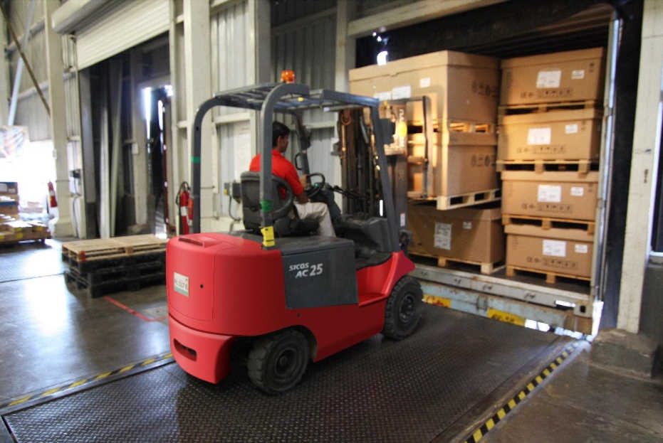 fork lift unloading goods