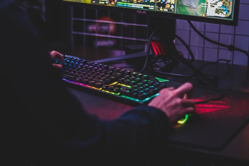 gamer using colorful keyboard