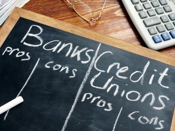 banks credit unions wirtten on chalk board