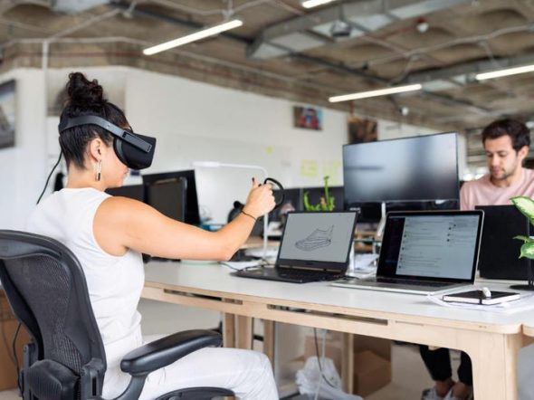 employee working with AR headset